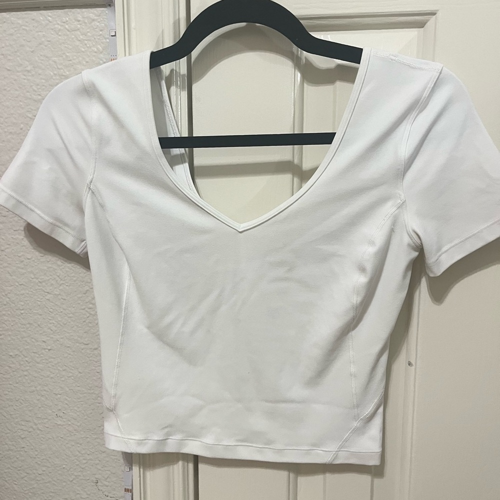 NWOT LULULEMON WHITE ALIGN T SHIRT SHORT SLEEVE W/ SMALL MARK ON BACK SEE DESC.